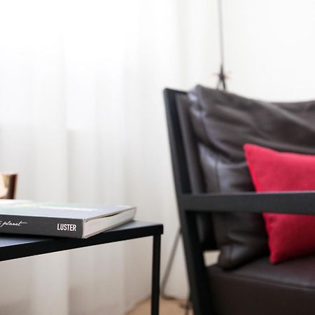 Maison Nationale City Flats & Suites Antwerpen Phòng bức ảnh The interior of the hotel