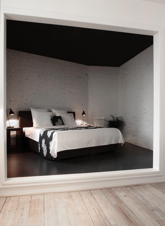Maison Nationale City Flats & Suites Antwerpen Phòng bức ảnh A bedroom